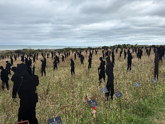 Standing with Giants silhouettes commemorating the fallen at the British Normandy Memorial